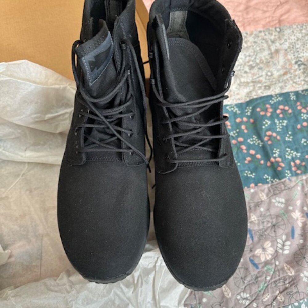 Ruck brand boots, never worn, in the box.